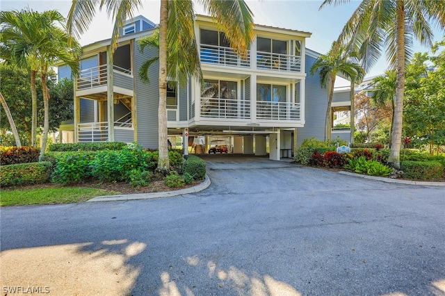 view of front of property with a balcony