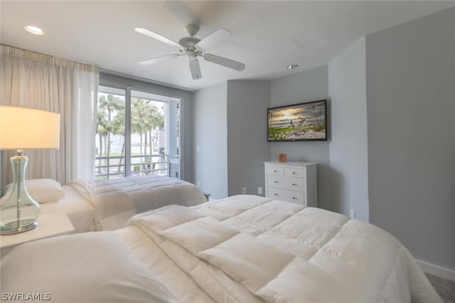 bedroom with ceiling fan and access to exterior