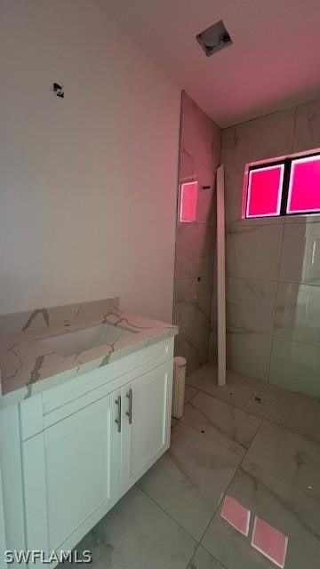 bathroom featuring vanity and tile flooring