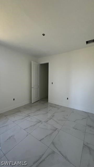 view of tiled empty room