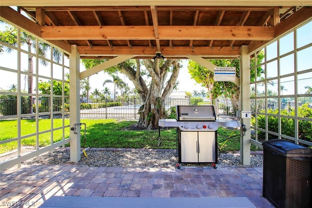 view of terrace with a gazebo and grilling area