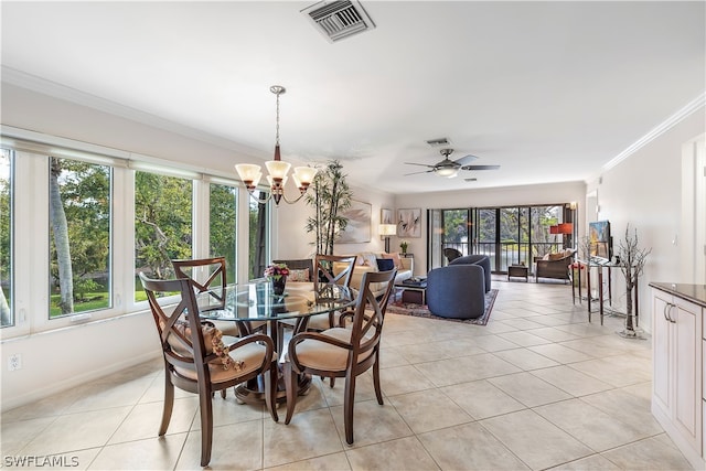 dining space featuring crown molding, ceiling fan with notable chandelier, and light tile floors