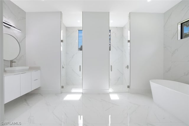 bathroom featuring shower with separate bathtub, tile patterned floors, and vanity