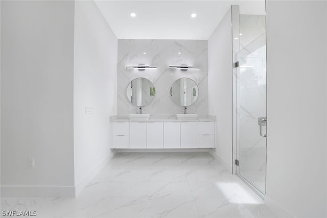 bathroom featuring tile patterned flooring, vanity, and an enclosed shower