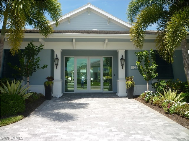 property entrance featuring french doors