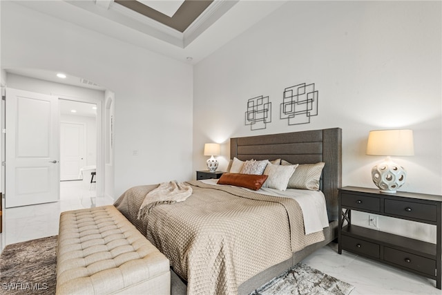 bedroom with crown molding