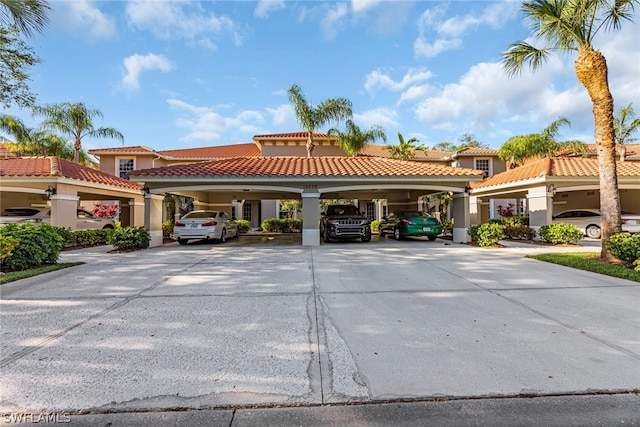 view of front of home with a carport