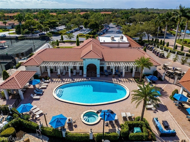 view of pool featuring a patio