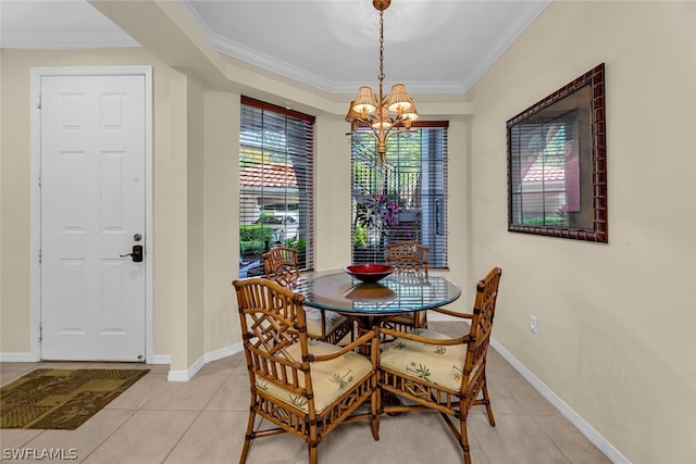 dining area featuring crown molding, a chandelier, and light tile floors