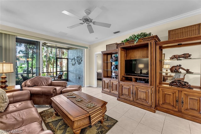 living room with light tile flooring, ornamental molding, and ceiling fan