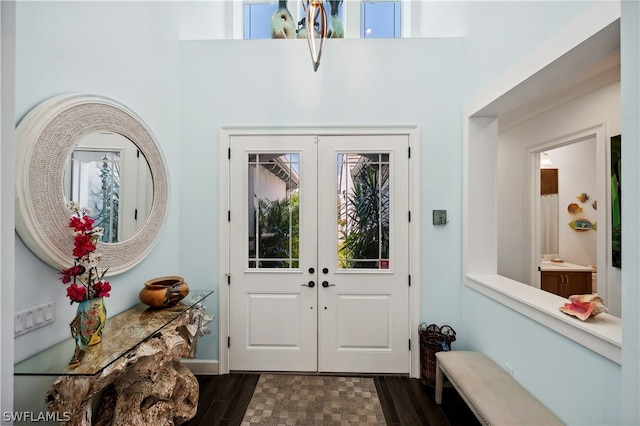 foyer featuring french doors and dark hardwood / wood-style flooring