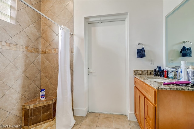 bathroom with a shower with shower curtain, vanity, and tile flooring