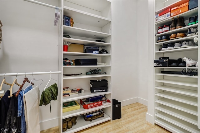 walk in closet featuring light hardwood / wood-style floors