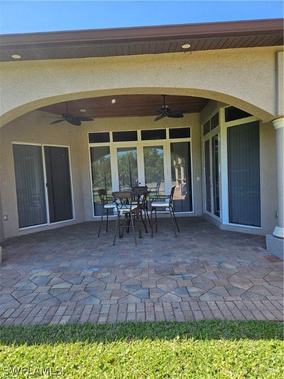 view of patio with ceiling fan