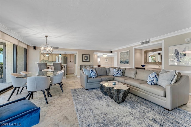 living room with ornamental molding, sink, a chandelier, and light tile patterned floors