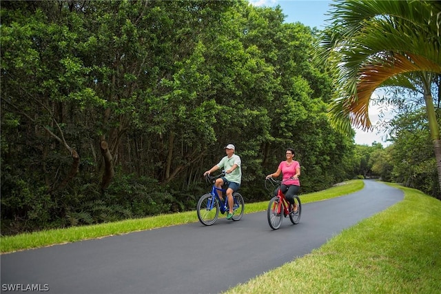 surrounding community featuring a yard