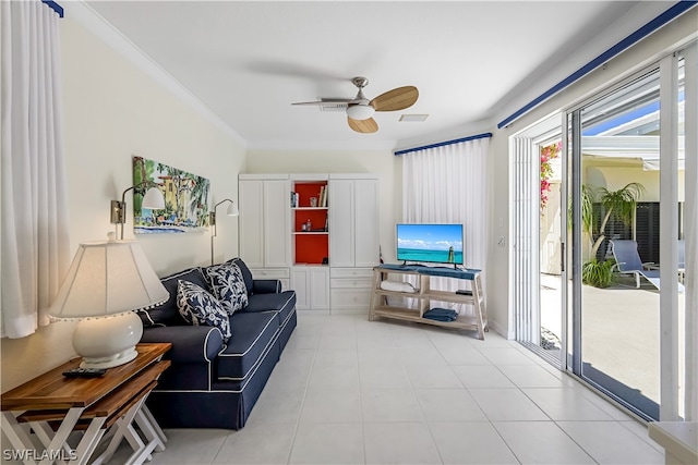 tiled living room with crown molding and ceiling fan