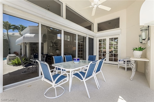 sunroom with french doors and ceiling fan