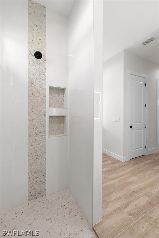 bathroom featuring wood-type flooring