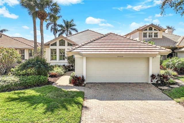 view of front of home with a garage