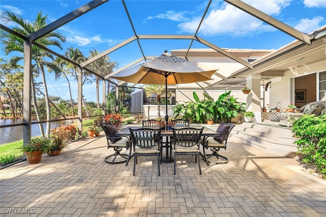 view of patio / terrace with glass enclosure