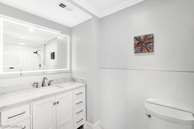 bathroom with walk in shower, vanity, ornamental molding, and toilet