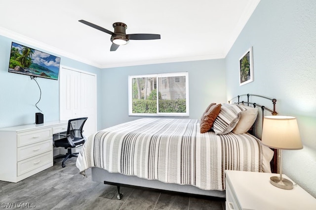 bedroom with ceiling fan, dark hardwood / wood-style floors, ornamental molding, and a closet