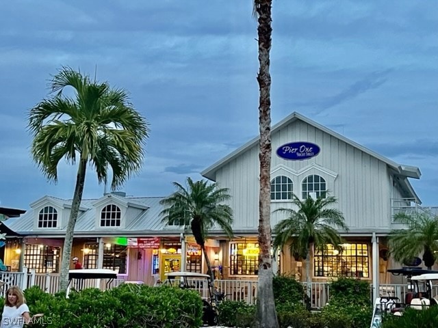 view of outdoor building at dusk