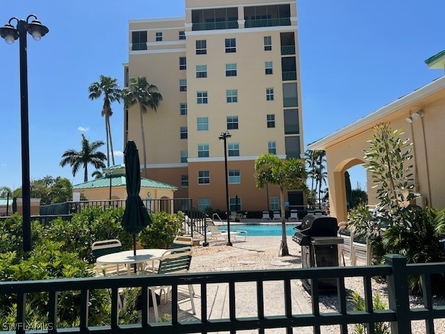 view of property featuring a community pool