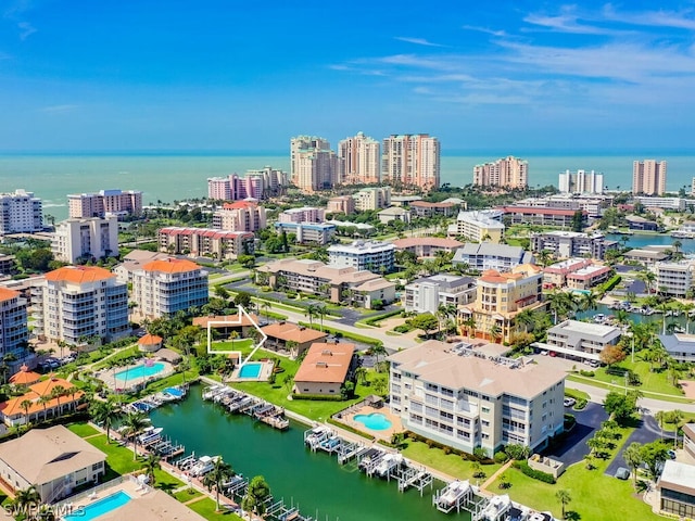 birds eye view of property featuring a water view