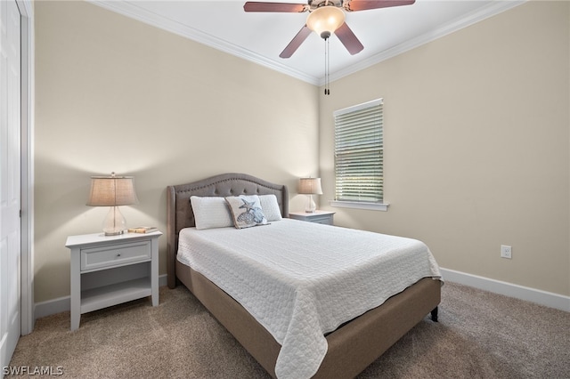 bedroom with ornamental molding, carpet flooring, and ceiling fan