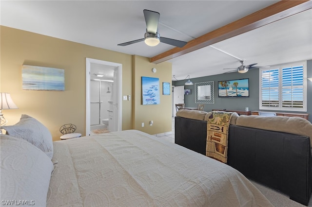 bedroom featuring ceiling fan, connected bathroom, and beam ceiling