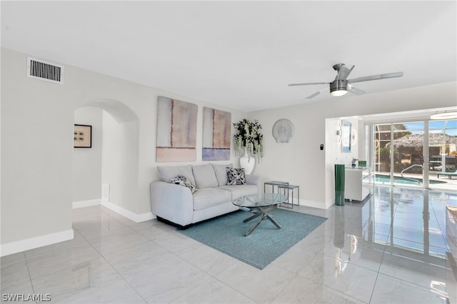 living room with ceiling fan