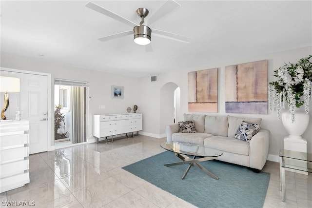 living room featuring ceiling fan