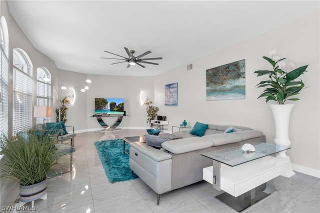 living room featuring ceiling fan