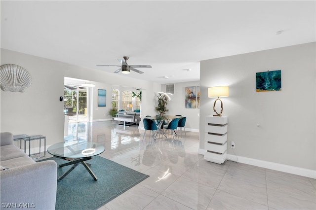 living room with ceiling fan