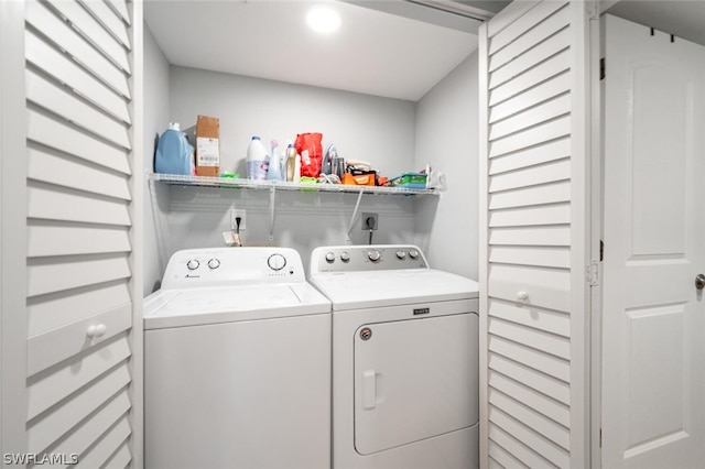 washroom featuring washing machine and clothes dryer and electric dryer hookup