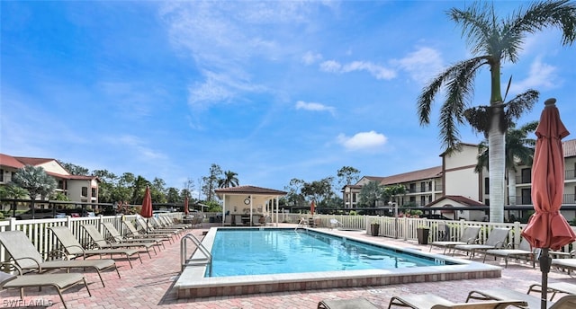 view of swimming pool with a patio