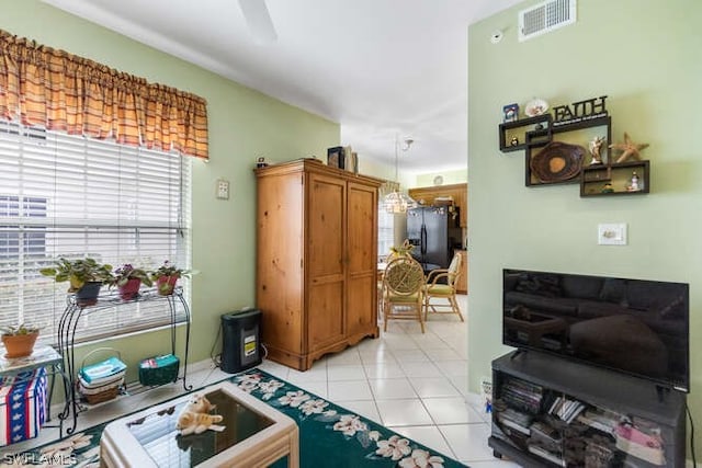 living room featuring light tile patterned floors