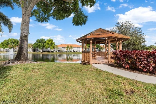 view of yard with a water view and a gazebo