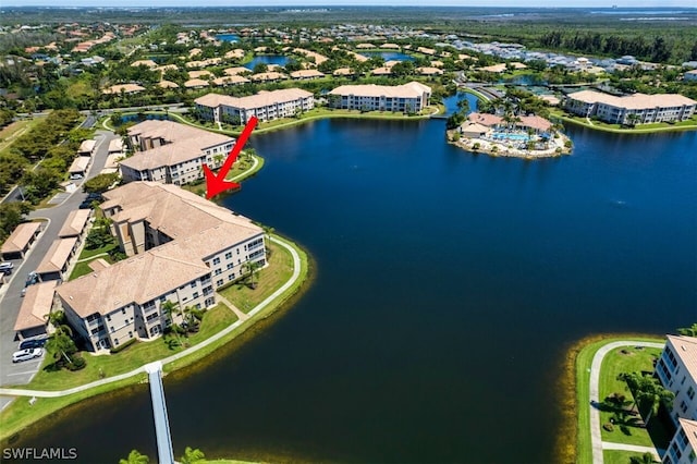 drone / aerial view featuring a water view