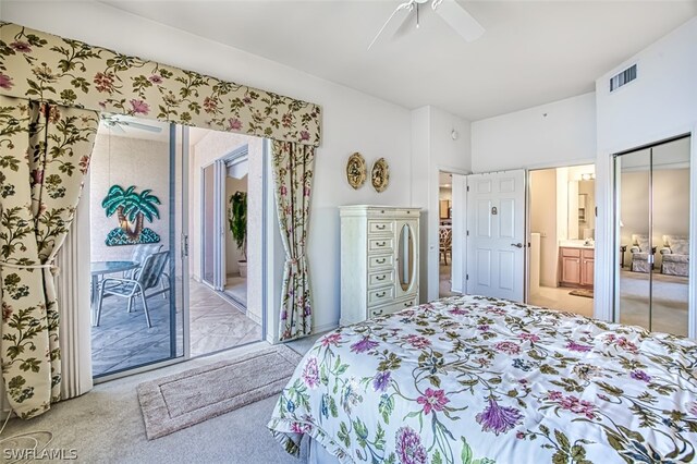 carpeted bedroom with a closet, connected bathroom, access to outside, and ceiling fan