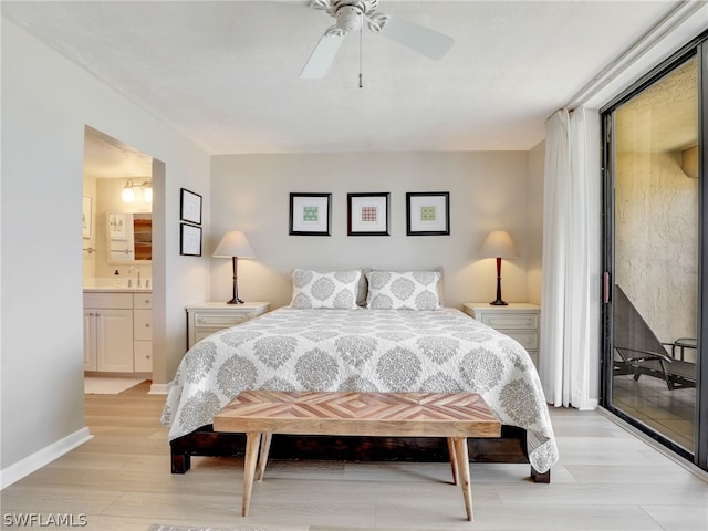 bedroom with connected bathroom, light hardwood / wood-style floors, and ceiling fan