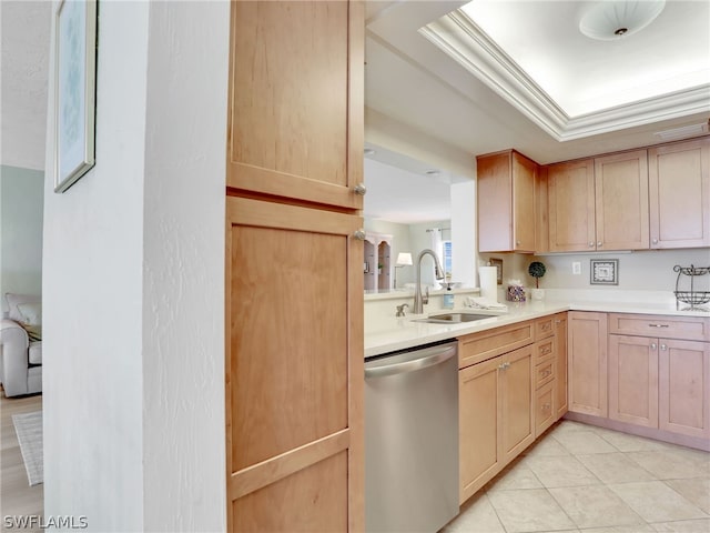 kitchen featuring sink, dishwasher, and light tile floors