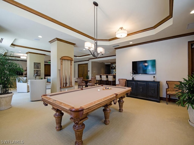 rec room with a raised ceiling, crown molding, light colored carpet, and billiards