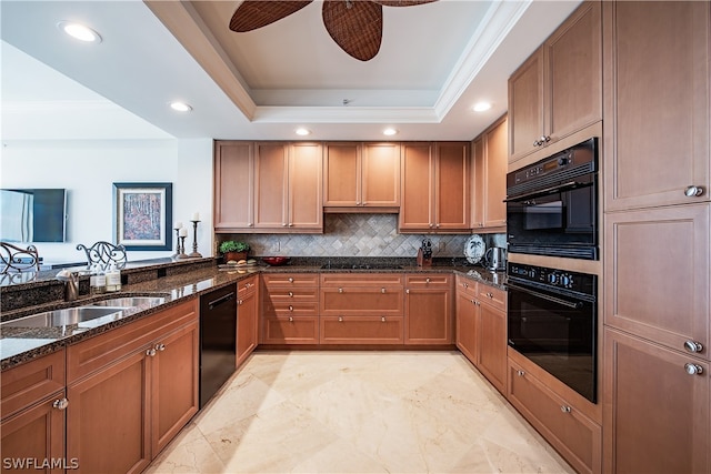 kitchen with backsplash, black appliances, crown molding, dark stone countertops, and a tray ceiling