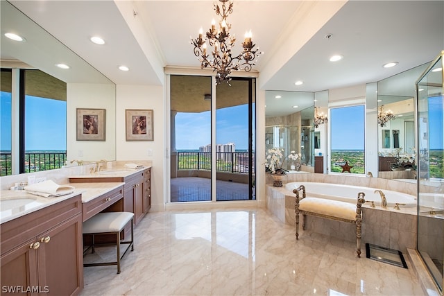 bathroom with a chandelier, vanity, separate shower and tub, and ornamental molding