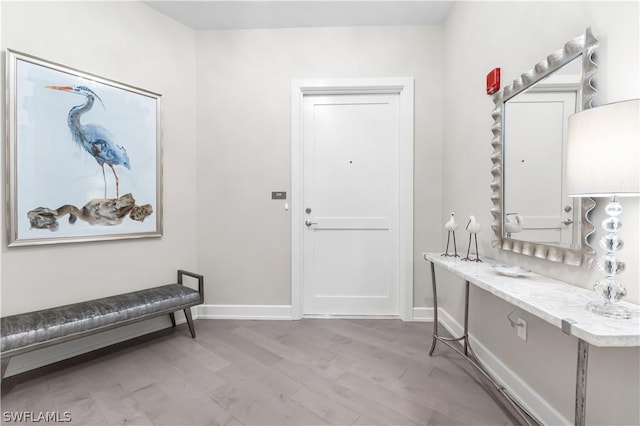 4142 Bay Beach Ln Unit 206, Fort Myers Beach, FL 33931 - foyer featuring baseboards and wood finished floors