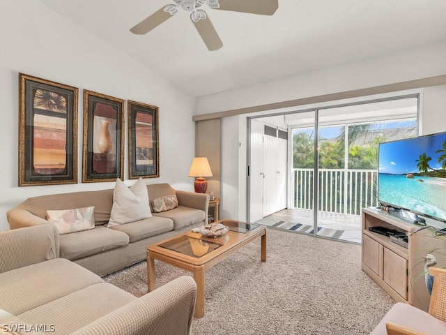 living room featuring light carpet, vaulted ceiling, and ceiling fan