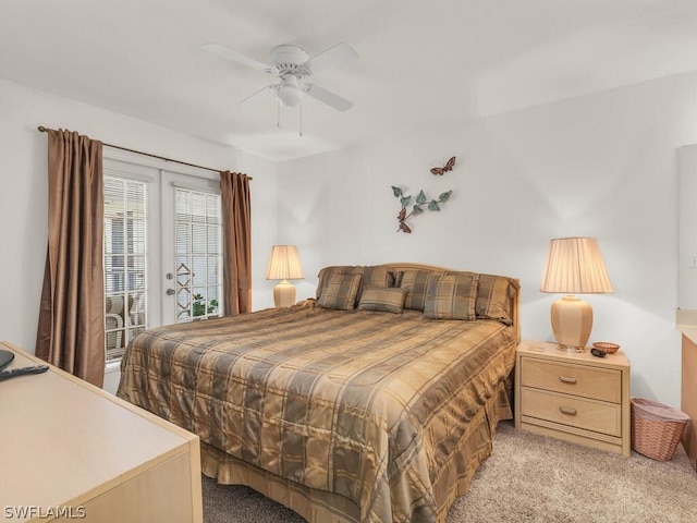 carpeted bedroom with ceiling fan, access to exterior, and french doors